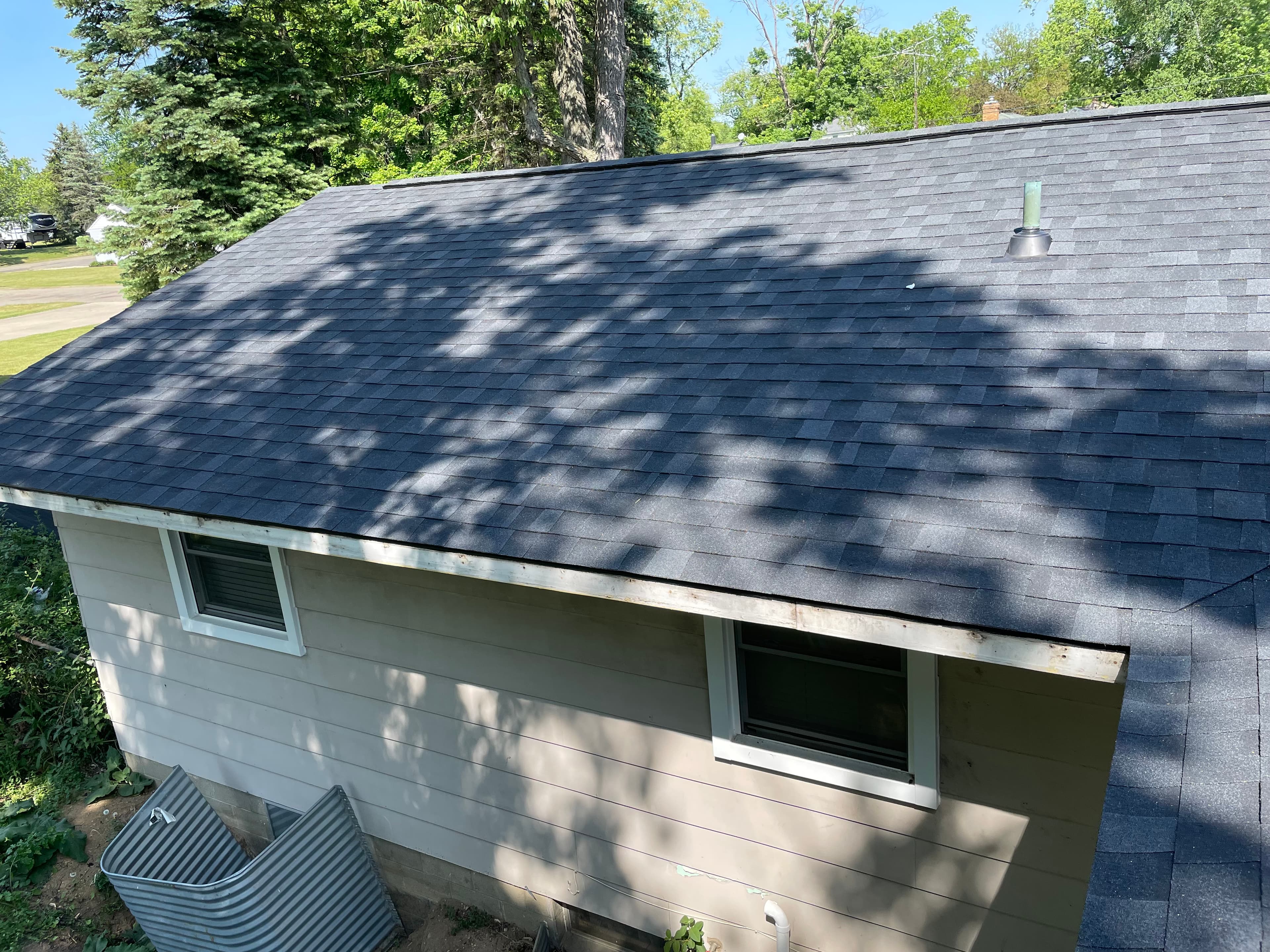 Completed shingle roof installation
